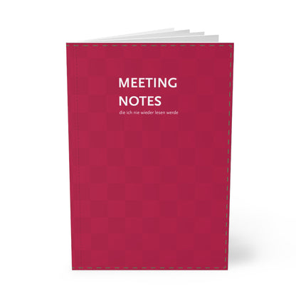 Rot-Pinkes Notizbuch mit der Aufschrift "Meeting Notes, die ich nie weder lesen werde"